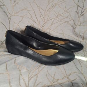 Michael Kors black flat size 9 with lock on back